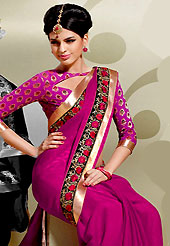 Welcome to the new era of Indian fashion wear. This magenta crepe saree is nicely designed with resham and patch in form of floral motifs. Beautiful patch border on saree make attractive to impress all. This saree gives you a modern and different look in fabulous style. Matching blouse is available with this saree. Slight color variations are possible due to differing screen and photograph resolution.