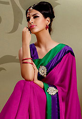 Exquisite combination of color, fabric can be seen here. This deep pink crepe saree is nicely designed with embroidered patch work in fabulous style. Embroidery is done with resham, zari and sequins work in form of floral motifs. Contrast patch border on saree make attractive to impress all. This saree gives you a modern and different look in fabulous style. Matching blouse is available with this saree. Slight color variations are possible due to differing screen and photograph resolution.