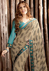 Let your personality articulate for you with this amazing printed saree. This dark fawn crepe saree is simply designed with leaf like print, resham, self weaving and patch work. This beautiful saree is used for casual porpose which gives you a singular and dissimilar look. Color blend of this saree is nice. Contrasting turquoise blue blouse is available with this saree. Slight color variations possible due to differing screen and photograph resolution.