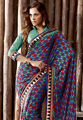 Welcome to the new era of Indian fashion wear. This blue, turquoise green and red saree is simply designed with geometric print and patch work. This beautiful saree is used for casual porpose which gives you a singular and dissimilar look. Color blend of this saree is nice. Matching blouse is available with this saree. Slight color variations possible due to differing screen and photograph resolution.
