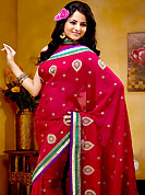 Keep the interest with this designer embroidery saree. This hot pink georgette saree is nicely designed with embroidered and silk patch work is done with sequins, stone and kasab work in form of floral motifs. Embroidery work is highlighting the beauty of the saree. Saree gives you a singular and dissimilar look. Matching blouse is available. Slight color variations are possible due to differing screen and photograph resolution.