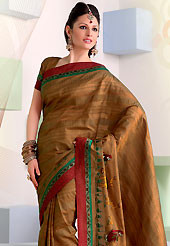 Outfit is a novel ways of getting yourself noticed. This brown raw silk saree have beautiful embroidery patch work which is embellished with resham work. Fabulous designed embroidery gives you an ethnic look and increasing your beauty. Matching blouse is available. Slight Color variations are possible due to differing screen and photograph resolutions.