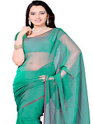 Look stunning rich with dark shades and floral patterns. Green tissue plain saree. This saree gives you a modern and different look in fabulous style. Matching blouse is available. Slight Color variations are possible due to differing screen and photograph resolutions.