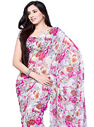 Style and trend will be at the peak of your beauty when you adorn this saree. This off white and pink chiffon saree which is embellished with floral print work. This saree gives you a modern and different look in fabulous style. Matching blouse is available. Slight Color variations are possible due to differing screen and photograph resolutions.