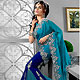Turquoise Blue and Royal Blue Faux Georgette Lehenga Style Saree with Blouse
