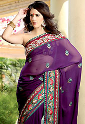 Embroidered sarees are the best choice for a girl to enhance her feminine look. This violet faux georgette saree have beautiful embroidery patch work which is embellished with resham and stone work in floral motifs. Fabulous designed embroidery gives you an ethnic look and increasing your beauty. Matching blouse is available. Slight Color variations are possible due to differing screen and photograph resolutions.