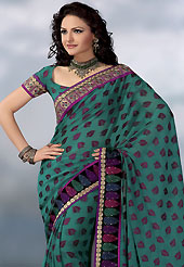 The fascinating beautiful subtly garment with lovely patterns. This turquoise green jacquard saree have beautiful leaf like print and embroidery patch work which is embellished with resham, zari and stone work in floral motifs. Fabulous designed embroidery gives you an ethnic look and increasing your beauty. Matching blouse is available. Slight Color variations are possible due to differing screen and photograph resolutions.