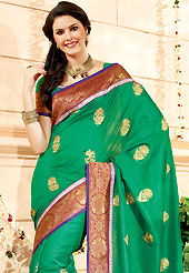 Try out this year top trend, glowing, bold and natural collection. This green faux georgette saree have beautiful embroidery patch work which is embellished with resham and zari work in floral motifs. Fabulous designed embroidery gives you an ethnic look and increasing your beauty. Matching blouse is available. Slight Color variations are possible due to differing screen and photograph resolutions.