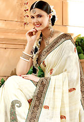It is color this season and bright shaded suits are really something that is totally in vogue. This white art silk saree have beautiful embroidery patch work which is embellished with resham and zari work. Fabulous designed embroidery gives you an ethnic look and increasing your beauty. Matching blouse is available. Slight Color variations are possible due to differing screen and photograph resolutions.