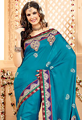 Welcome to the new era of Indian fashion wear. This blue banarasi silk saree have beautiful embroidery patch work which is embellished with resham work. Fabulous designed embroidery gives you an ethnic look and increasing your beauty. Matching blouse is available. Slight Color variations are possible due to differing screen and photograph resolutions.