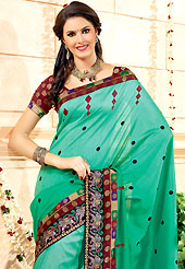 The traditional patterns used on this saree maintain the ethnic look. This green banarasi silk saree have beautiful embroidery patch work which is embellished with resham and self weaving zari work. Fabulous designed embroidery gives you an ethnic look and increasing your beauty. Contrasting maroon blouse is available. Slight Color variations are possible due to differing screen and photograph resolutions.