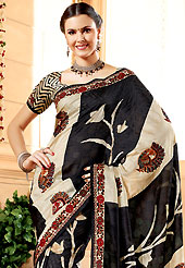 Take a look on the changing fashion of the season. This black and light fawn banarasi silk saree have beautiful embroidery patch work which is embellished with resham and stone work. Fabulous designed embroidery gives you an ethnic look and increasing your beauty. Matching blouse is available. Slight Color variations are possible due to differing screen and photograph resolutions.