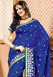 Get ready to sizzle all around you by sparkling saree. This dark blue banarasi silk saree have beautiful embroidery patch work which is embellished with zari work. Fabulous designed embroidery gives you an ethnic look and increasing your beauty. Matching blouse is available. Slight Color variations are possible due to differing screen and photograph resolutions.