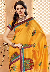 Your search for elegant look ends here with this lovely saree. This orange art silk saree have beautiful embroidery patch work which is embellished with resham and zari work. Fabulous designed embroidery gives you an ethnic look and increasing your beauty. Matching blouse is available. Slight Color variations are possible due to differing screen and photograph resolutions.