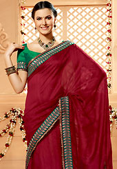 Ultimate collection of embroidery sarees with fabulous style. This brick red banarasi silk saree have beautiful embroidery patch work which is embellished with zari and stone work. Fabulous designed embroidery gives you an ethnic look and increasing your beauty. Contrasting green blouse is available. Slight Color variations are possible due to differing screen and photograph resolutions.