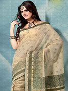 An casual wear perfect is ready to rock you. This cream and green cotton saree is nicely designed with floral, paisley print and self weaving work in fabulous style. This beautiful saree is used for casual porpose which gives you a singular and dissimilar look. Color blend of this saree is nice. Matching blouse is available with this saree. Slight Color variations are possible due to differing screen and photograph resolutions.