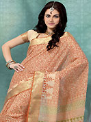 Dreamy variation on shape and forms compliment your style with tradition. This cream and orange cotton saree is nicely designed with floral, geometric print and self weaving work in fabulous style. This beautiful saree is used for casual porpose which gives you a singular and dissimilar look. Color blend of this saree is nice. Matching blouse is available with this saree. Slight Color variations are possible due to differing screen and photograph resolutions.