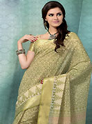 The evolution of style species collection spells pure femininity. This cream and light olive green cotton saree is nicely designed with floral print and self weaving work in fabulous style. This beautiful saree is used for casual porpose which gives you a singular and dissimilar look. Color blend of this saree is nice. Matching blouse is available with this saree. Slight Color variations are possible due to differing screen and photograph resolutions.