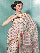 The traditional patterns used on this saree maintain the ethnic look. This off white and red cotton saree is nicely designed with floral, paisley and geometric print work in fabulous style. This beautiful saree is used for casual porpose which gives you a singular and dissimilar look. Color blend of this saree is nice. Matching blouse is available with this saree. Slight Color variations are possible due to differing screen and photograph resolutions.