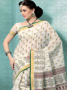 An endearing splash oh colors look gorgeous tridimensional charm. This off white and green cotton saree is nicely designed with floral and geometric print work in fabulous style. This beautiful saree is used for casual porpose which gives you a singular and dissimilar look. Color blend of this saree is nice. Matching blouse is available with this saree. Slight Color variations are possible due to differing screen and photograph resolutions.