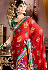 An endearing splash oh colors look gorgeous tridimensional charm. This red and purple faux georgette and brocade saree is nicely designed with bandhej print, embroidered and silk patch work is done with kundan, kasab, cutdana, sequins, stone and gota patti work. Embroidery work is highlighting the beauty of the saree. Saree gives you a singular and dissimilar look. Contrasting green blouse is available. Slight color variations are possible due to differing screen and photograph resolution.