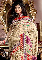 It is color this season and bright shaded suits are really something that is totally in vogue. This light fawn and red banarasi brocade saree is nicely designed with embroidered and brocade patch work is done with Kundan, kasab, cutdana, sequins and stone work. Embroidery work is highlighting the beauty of the saree. Saree gives you a singular and dissimilar look. Matching blouse is available. Slight color variations are possible due to differing screen and photograph resolution.