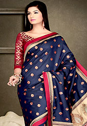 An endearing splash oh colors look gorgeous tridimensional charm. This navy blue art dupion silk and brocade saree is nicely designed with embroidered and brocade patch work is done with kasab work. Embroidery work is highlighting the beauty of the saree. Saree gives you a singular and dissimilar look. Contrasting maroon blouse is available. Slight color variations are possible due to differing screen and photograph resolution.