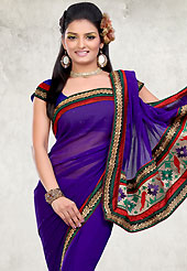 Elegance and innovation of designs crafted for you. This violet faux georgette saree is nicely designed with embroidered patch work is done with resham, zari and stone work. Saree gives you a singular and dissimilar look. Matching blouse is available. Slight color variations are possible due to differing screen and photograph resolution.