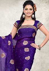 Attract all attentions with this embroidered saree. This violet faux chiffon saree is nicely designed with embroidered patch work is done with resham, zari and stone work. Saree gives you a singular and dissimilar look. Matching blouse is available. Slight color variations are possible due to differing screen and photograph resolution.