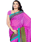 This season dazzle and shine in pure colors. This magenta and green georgette saree have beautifully embellished with floral and geometric print work. This saree gives you a modern and different look in fabulous style. Matching blouse is available. Slight Color variations are possible due to differing screen and photograph resolutions.
