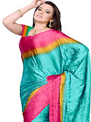 Look stunning rich with dark shades and floral patterns. This aqua blue, dark yellow and pink satin silk saree gives you a modern and different look in fabulous style. Matching blouse is available. Slight Color variations are possible due to differing screen and photograph resolutions.