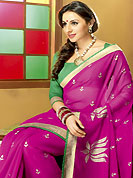 Let your personality articulate for you with this amazing embroidered saree. This magenta chiffon saree is nicely designed with flower print and patch border work. Saree gives you a singular and dissimilar look. Contrasting green blouse is available. Slight color variations are possible due to differing screen and photograph resolution.
