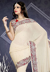 The fascinating beautiful subtly garment with lovely patterns. This cream faux georgette saree is nicely designed with embroidered patch work is done with zari, sequins and cut work. This saree gives you a modern and different look in fabulous style. Matching blouse is available with this saree. Slight color variations are possible due to differing screen and photograph resolution.