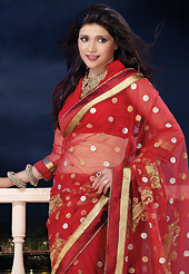 Elegance and innovation of designs crafted for you. This red net saree is nicely designed with embroidered and patch border work is done with zari, stone and lace work. Saree gives you a singular and dissimilar look. Matching blouse is available. Slight color variations are possible due to differing screen and photograph resolution.