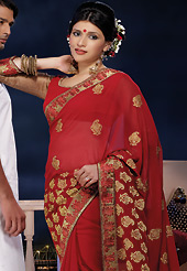 Embroidered sarees are the best choice for a girl to enhance her feminine look. This red chiffon saree is nicely designed with embroidered and patch border work is done with zari and stone work. Saree gives you a singular and dissimilar look. Matching chiffon and brocade blouse is available. Slight color variations are possible due to differing screen and photograph resolution.