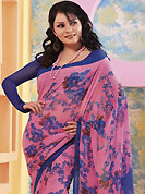 It is color this season and bright shaded suits are really something that is totally in vogue. This pink and blue faux georgette saree is nicely designed with floral and geometric print work. Saree gives you a singular and dissimilar look. Matching blouse is available. Slight color variations are possible due to differing screen and photograph resolution.
