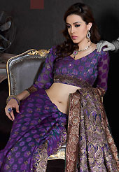 Attract all attentions with this embroidered saree. This violet net saree is nicely designed with embroidered patch work is done with resham, zari and sequins work. Saree gives you a singular and dissimilar look. Matching blouse is available. Slight color variations are possible due to differing screen and photograph resolution.