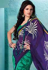 An occasion wear perfect is ready to rock you. This violet and green faux georgette saree is nicely designed with floral, stripe print and patch bordered work. Saree gives you a singular and dissimilar look. Matching green blouse is available. Slight color variations are possible due to differing screen and photograph resolution.
