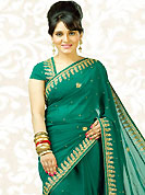 Elegance and honourable come together in this beautiful drape. Add a vibrant burst of color to your wardrobe with this green chiffon saree is nicely designed with embroidered patch work is done with beads, stones, gold zardosi and cutdana work. Saree gives you a singular and dissimilar look. Matching blouse is available. Slight color variations are possible due to differing screen and photograph resolution.