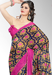 A desire that evokes a sense of belonging with a striking details. This navy blue and pink faux georgette saree is nicely designed with floral, abstract print and patch work. Saree gives you a singular and dissimilar look. Matching blouse is available. Slight color variations are possible due to differing screen and photograph resolution.