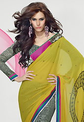 Ultimate collection of embroidered sarees with fabulous style. This light olive green, off white and black faux georgette saree is nicely designed with floral, paisley print, self weaving zari and lace work. This saree gives you a modern and different look in fabulous style. Matching blouse is available. Slight color variations are possible due to differing screen and photograph resolution.