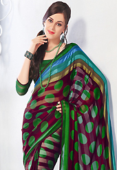 Dreamy variation on shape and forms compliment your style with tradition. This burgundy and green brasso faux georgette saree is simply designed with geometric print work. This beautiful saree is used for casual porpose which gives you a singular and dissimilar look. Color blend of this saree is nice. Matching blouse is available with this saree. Slight color variations possible due to differing screen and photograph resolution.