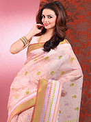 Elegance and innovation of designs crafted for you. This beautiful off white and orange cotton saree is nicely designed with block print and self weaving zari work. Beautiful print work on saree make attractive to impress all. It will enhance your personality and gives you a singular look. Matching blouse is available with this saree. Slight color variations are due to differing screen and photography resolution.