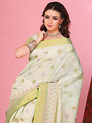 The most beautiful refinements for style and tradition. This beautiful off white and light green cotton saree is nicely designed with block print and self weaving zari work. Beautiful print work on saree make attractive to impress all. It will enhance your personality and gives you a singular look. Matching blouse is available with this saree. Slight color variations are due to differing screen and photography resolution.