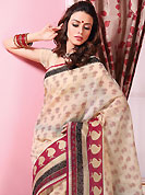 Be the cynosure of all eyes with this wonderful casual wear in flattering colors and combinations. This beautiful light fawn and red cotton saree is nicely designed with floral, paisley, abstract print and self weaving zari work. Beautiful print work on saree make attractive to impress all. It will enhance your personality and gives you a singular look. Matching blouse is available with this saree. Slight color variations are due to differing screen and photography resolution.