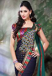 Look stunning rich with dark shades and floral patterns This navy blue and green faux chiffon saree is nicely designed with embroidered patch work is done with resham, zari, sequins, zardosi and stone work. Beautiful embroidery work on saree make attractive to impress all. This saree gives you a modern and different look in fabulous style. Contrasting multicolor blouse is available. Slight color variations are possible due to differing screen and photograph resolution.