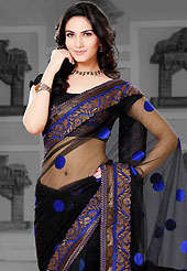 The fascinating beautiful subtly garment with lovely patterns. This black net saree is nicely designed with embroidered patch work is done with resham and zari work. Beautiful embroidery work on saree make attractive to impress all. This saree gives you a modern and different look in fabulous style. Matching blouse is available. Slight color variations are possible due to differing screen and photograph resolution.