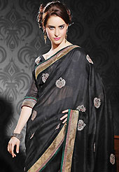 Try out this year top trend, glowing, bold and natural collection. This black art silk saree is nicely designed with embroidered patch work is done with resham, zari and sequins work. Beautiful embroidery work on saree make attractive to impress all. This saree gives you a modern and different look in fabulous style. Matching blouse is available. Slight color variations are possible due to differing screen and photograph resolution.