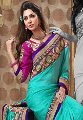 The most beautiful refinements for style and tradition. This aqua blue art silk saree is nicely designed with embroidered patch work is done with resham, zari, sequins and beads work. Beautiful embroidery work on saree make attractive to impress all. This saree gives you a modern and different look in fabulous style. Contrasting dark pink blouse is available. Slight color variations are possible due to differing screen and photograph resolution.