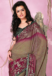 Welcome to the new era of Indian fashion wear. This beautiful dusty olive green and deep pink shimmer faux georgette saree is nicely designed with floral, paisley print and graceful patch border work. Beautiful print work on saree make attractive to impress all. It will enhance your personality and gives you a singular look. Matching blouse is available with this saree. Slight color variations are due to differing screen and photography resolution.